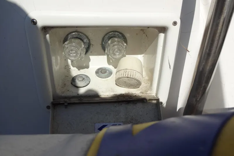 Slide: The Image of Boat plumbing compartment with valves and fittings on a 1996 Lagoon 35 CCC. - 45