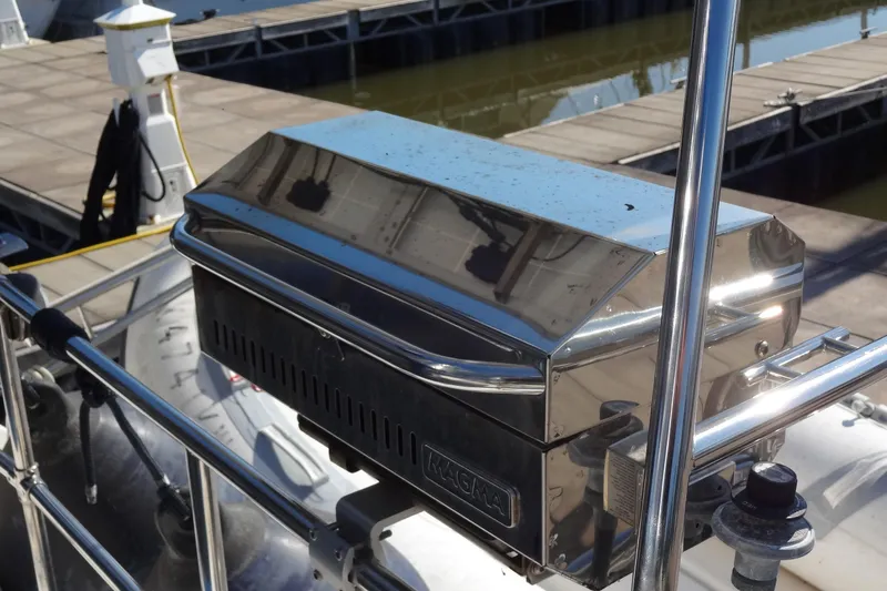 Slide: The Image of Stainless steel grill on 1996 Lagoon 35 CCC yacht at marina dock. - 49