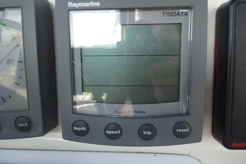 Slide: The Image of Raymarine Tridata display on 1996 Lagoon 35 CCC yacht dashboard. - 83