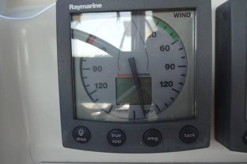 Slide: The Image of Raymarine wind gauge on 1996 Lagoon 35 CCC yacht dashboard. - 84
