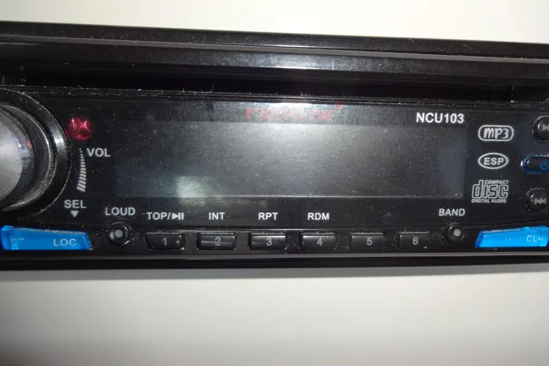 Slide: The Image of Close-up of a 1996 Lagoon 35 CCC car stereo system with MP3 and CD features. - 93