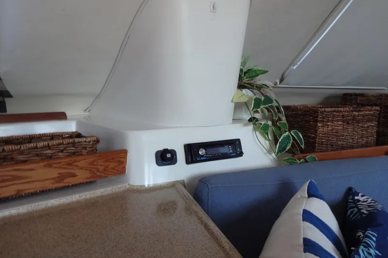 Slide: The Image of Interior of 1996 Lagoon 35 CCC yacht with wicker baskets and stereo system. - 95