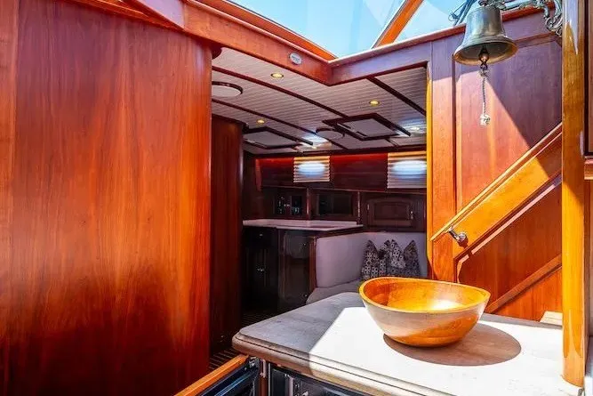 Slide: The Image of Luxurious interior of 2021 Hinckley Talaria 55 Flybridge MKII yacht with wooden finishes. - 37