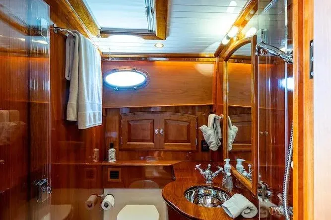 Slide: The Image of Luxurious wooden bathroom interior on 2021 Hinckley Talaria 55 Flybridge MKII yacht. - 39