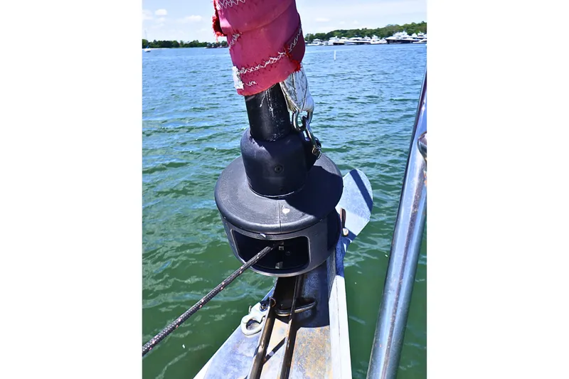 Slide: The Image of Close-up of a 1989 J Boat J 40 sailboat's furling system on a sunny day. - 15
