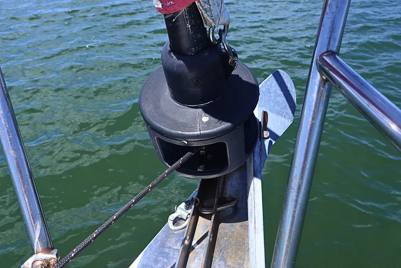 Slide: The Image of Close-up of a 1989 J Boat J 40 sailboat's bow with furler and railing. - 16