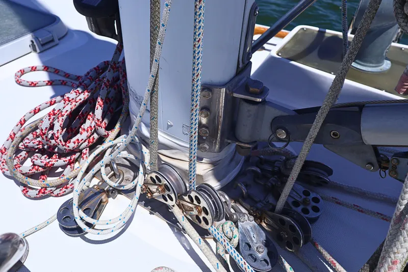 Slide: The Image of Close-up of rigging and pulleys on a 1989 J Boat J 40 sailboat deck. - 18