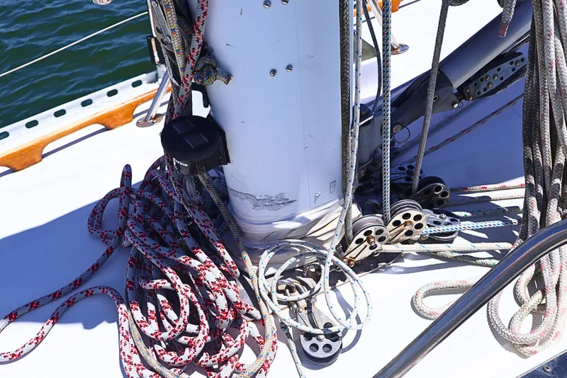Slide: The Image of Deck of 1989 J Boat J 40 with ropes and pulleys in sunlight. - 19