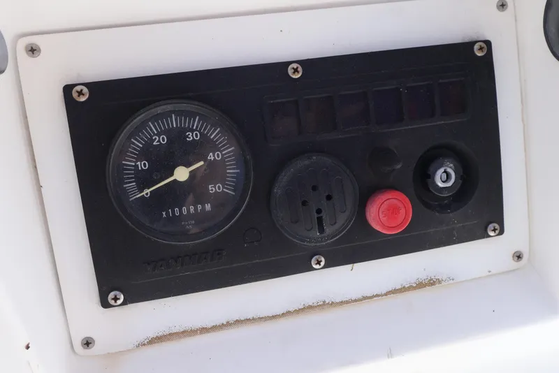Slide: The Image of Control panel of a 1989 J Boat J 40 with Yanmar RPM gauge. - 20