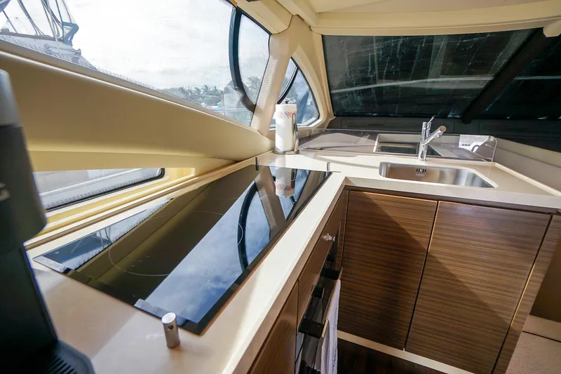Slide: The Image of Modern kitchen interior of 2014 Azimut 54 Flybridge yacht with sleek design and appliances. - 37