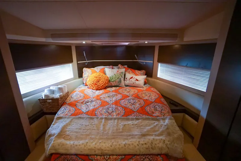 Slide: The Image of Luxurious bedroom interior of 2014 Azimut 54 Flybridge yacht with vibrant bedding. - 38