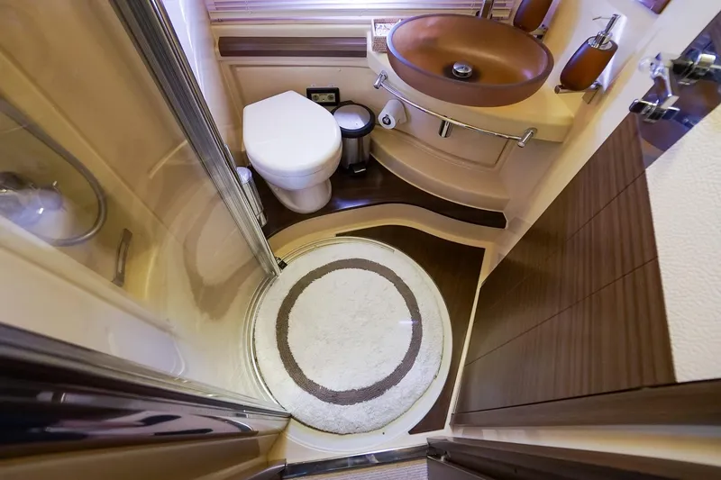 Slide: The Image of Luxurious bathroom in 2014 Azimut 54 Flybridge yacht with modern fixtures and elegant design. - 44