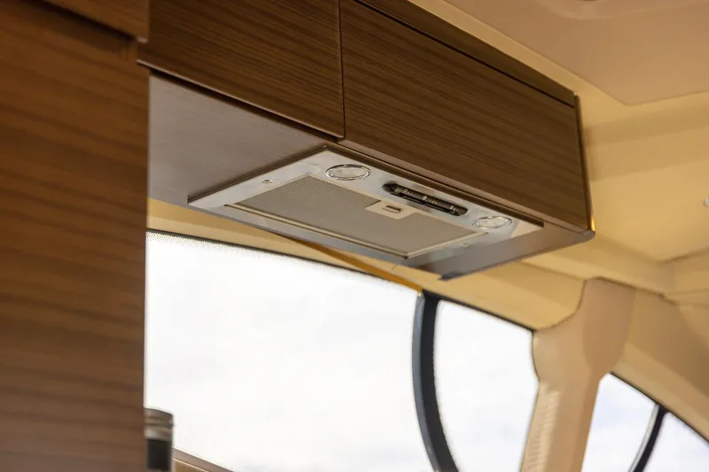 Slide: The Image of Interior view of 2014 Azimut 54 Flybridge yacht's modern kitchen cabinetry. - 52