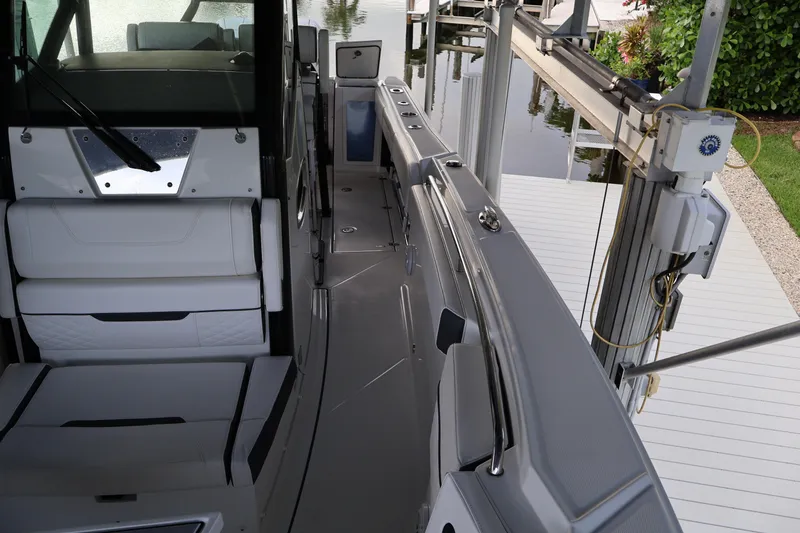 Slide: The Image of 2021 Blackfin 272 CC boat interior with sleek seating and modern design. - 33