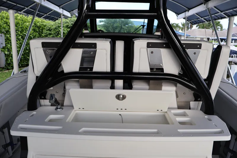 Slide: The Image of 2021 Blackfin 272 CC boat interior with seating and storage compartments. - 22