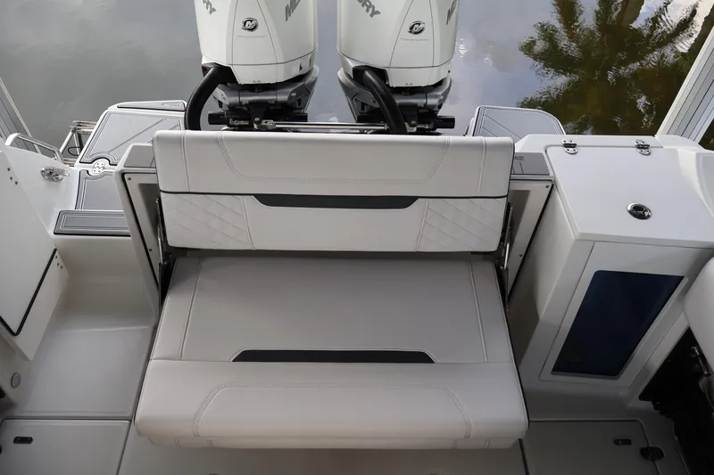 Slide: The Image of 2021 Blackfin 272 CC boat with dual Mercury engines and comfortable seating. - 37