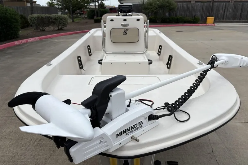 Slide: The Image of 2024 Carolina Skiff E18 JVX CC boat with Minn Kota PowerDrive trolling motor. - 7