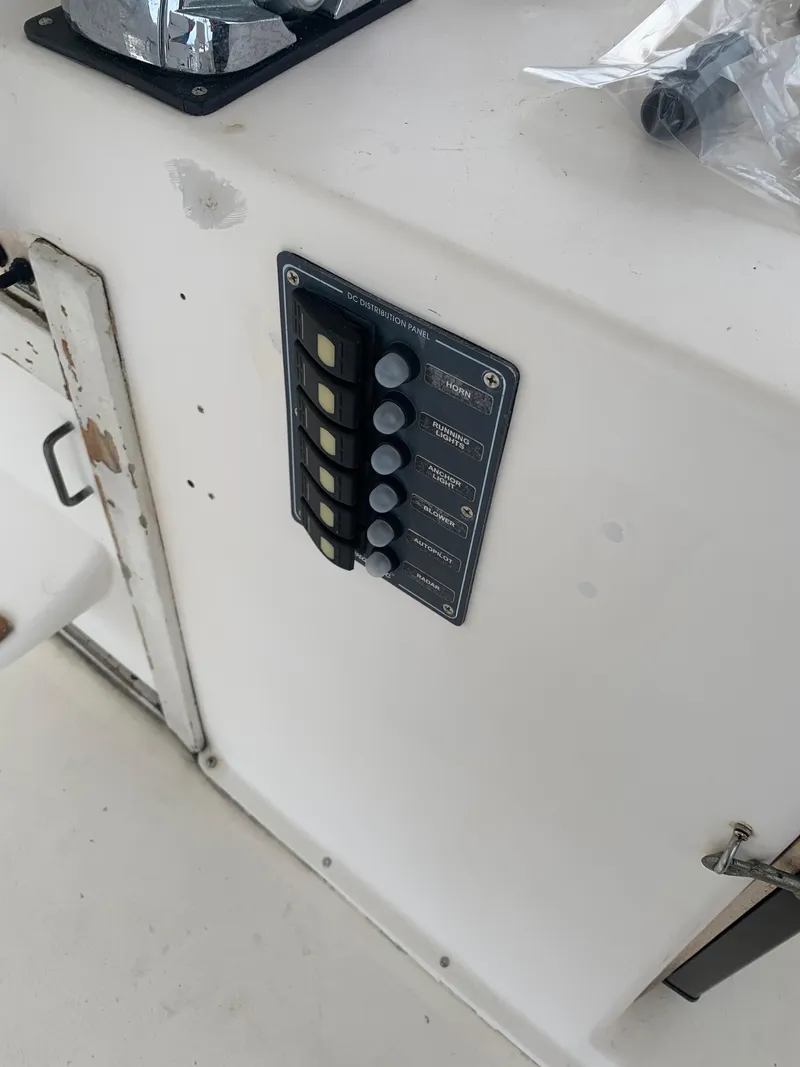 Slide: The Image of Control panel on a 1985 Ocean Yachts 55 Super Sport boat. - 14