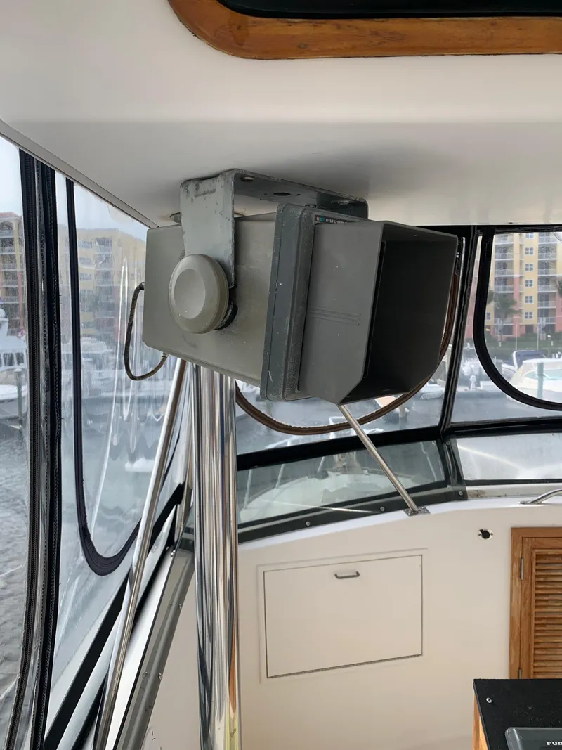 Slide: The Image of 1985 Ocean Yachts 55 Super Sport interior with mounted equipment. - 17