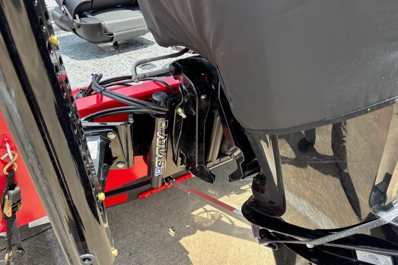 Slide: The Image of 2026 Tracker Pro Team 190 TX boat motor and hydraulic system close-up. - 4
