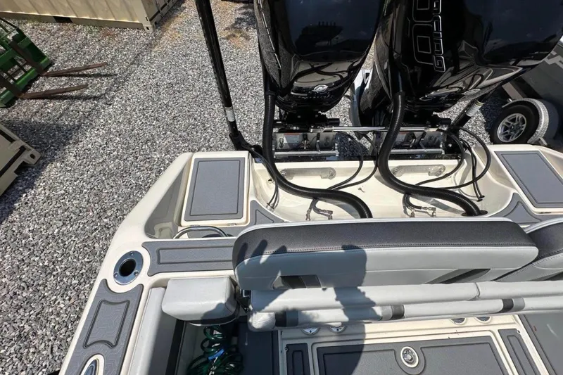 Slide: The Image of 2020 Blackwood 270 LXF boat with dual outboard engines, rear seating, and storage compartments. - 11