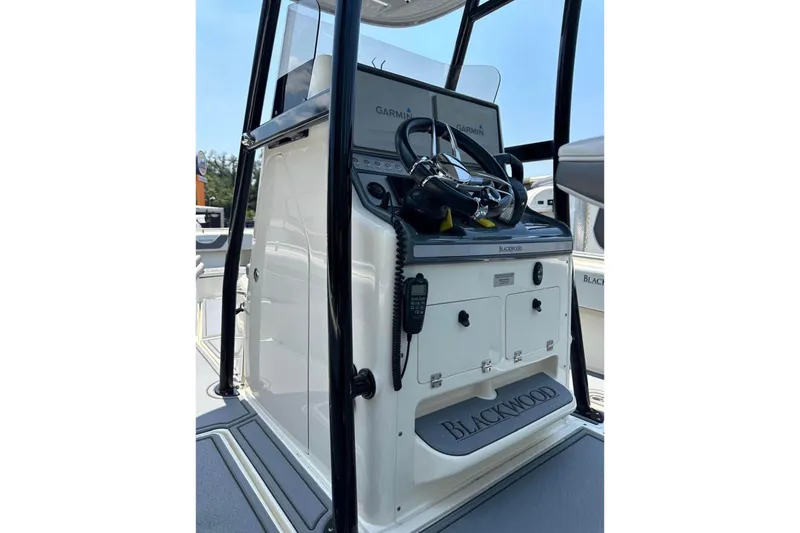 Slide: The Image of 2020 Blackwood 270 LXF boat console with steering wheel and Garmin electronics. - 4