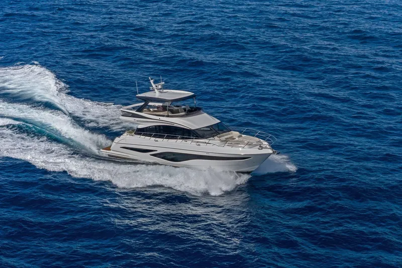 Slide: The Image of Luxurious 2026 Princess F65 yacht cruising on open blue sea. - 10
