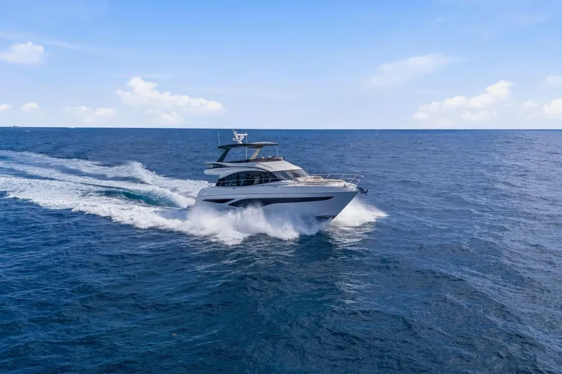 Slide: The Image of Luxury yacht Princess F65 2026 cruising on open sea. - 12