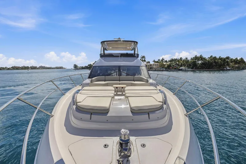 Slide: The Image of Luxurious 2026 Princess F65 yacht cruising on a sunny day, featuring spacious deck seating. - 15