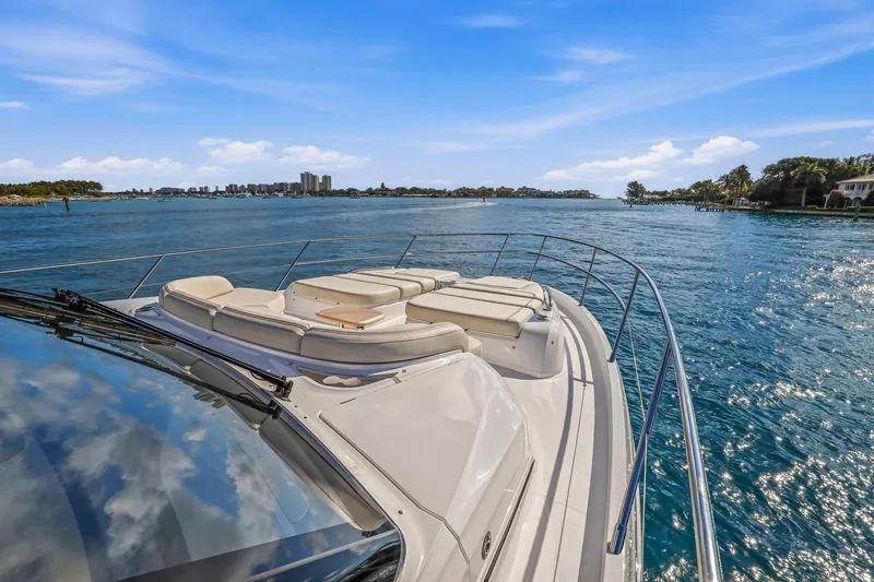 Slide: The Image of Luxurious 2026 Princess F65 yacht cruising on a sunny day with scenic waterfront views. - 17