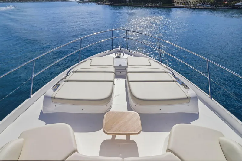 Slide: The Image of Luxurious 2026 Princess F65 yacht deck with sun loungers and ocean view. - 18
