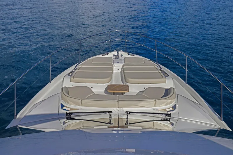 Slide: The Image of Luxurious 2026 Princess F65 yacht with spacious sunbathing deck on calm blue waters. - 20