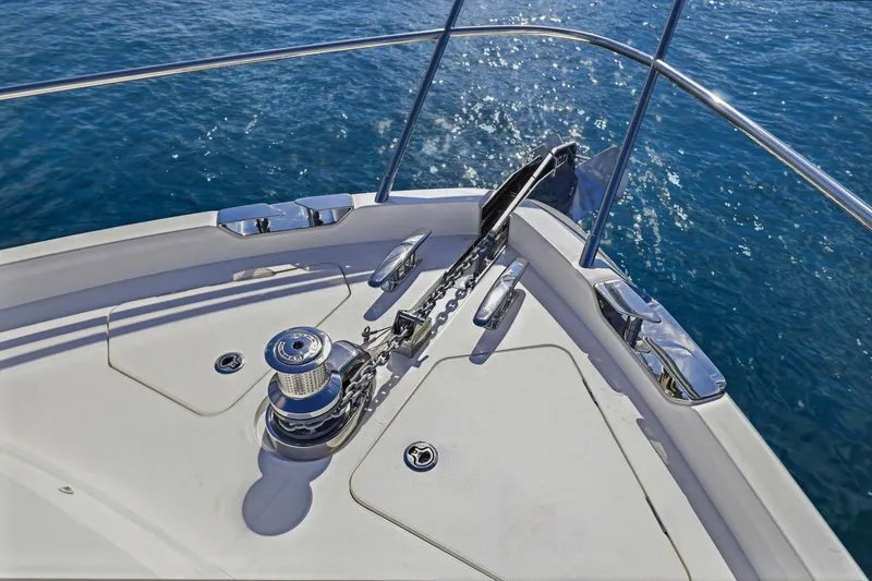 Slide: The Image of Bow of 2026 Princess F65 yacht with anchor and winch system on blue water. - 21