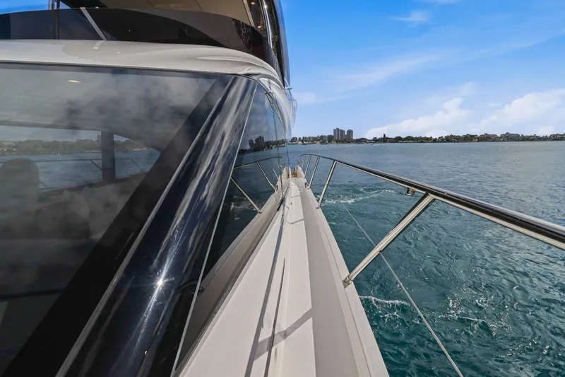 Slide: The Image of Side view of 2026 Princess F65 yacht cruising on open water. - 22
