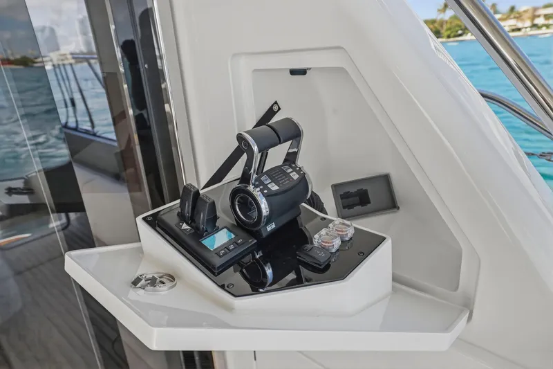 Slide: The Image of Control panel of 2026 Princess F65 yacht with throttle and navigation controls. - 24