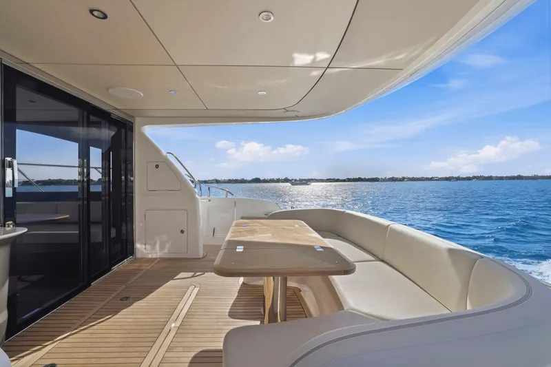 Slide: The Image of Luxurious 2026 Princess F65 yacht deck with ocean view and elegant seating area. - 25