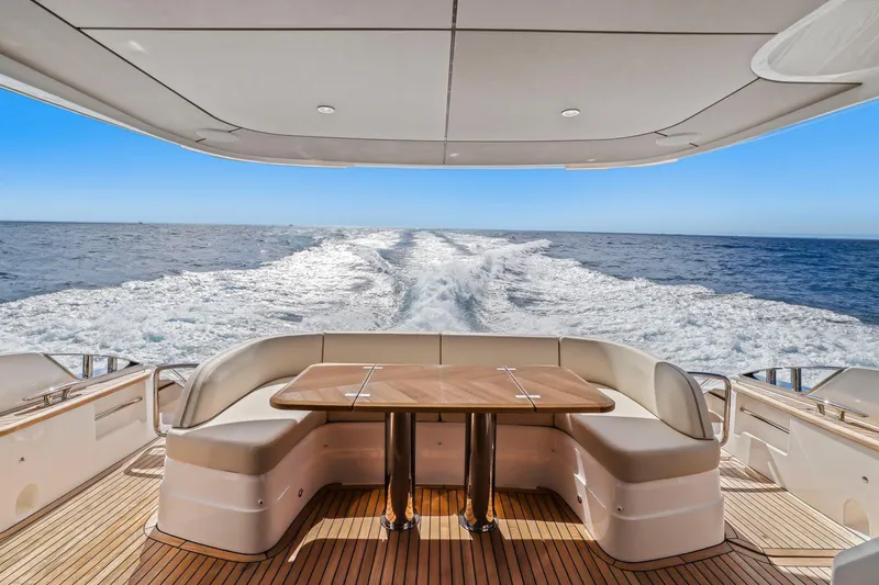 Slide: The Image of Luxurious 2026 Princess F65 yacht cruising on open sea with elegant deck seating. - 26