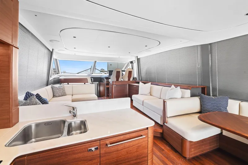 Slide: The Image of Luxurious interior of 2026 Princess F65 yacht with modern seating and sleek design. - 30