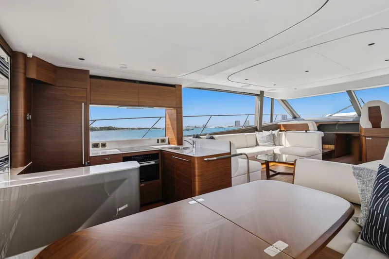 Slide: The Image of Luxurious interior of 2026 Princess F65 yacht with modern wood finishes and panoramic windows. - 32