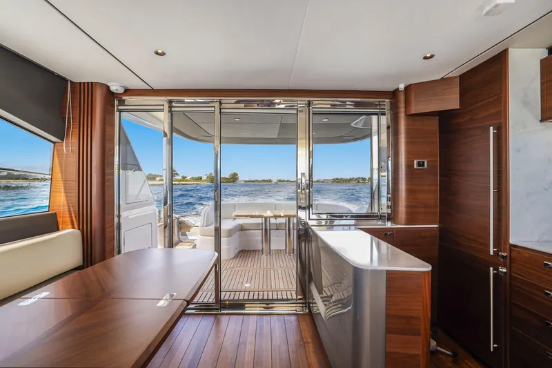 Slide: The Image of Luxurious interior of 2026 Princess F65 yacht with ocean view through glass doors. - 33