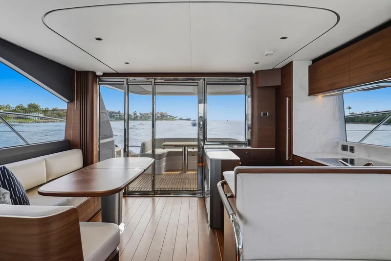 Slide: The Image of Luxurious interior of 2026 Princess F65 yacht with elegant wood finishes and waterfront view. - 41