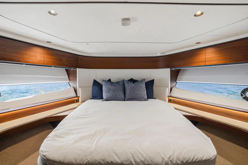 Slide: The Image of Luxurious bedroom interior of 2026 Princess F65 yacht with elegant wood accents and ocean view. - 50
