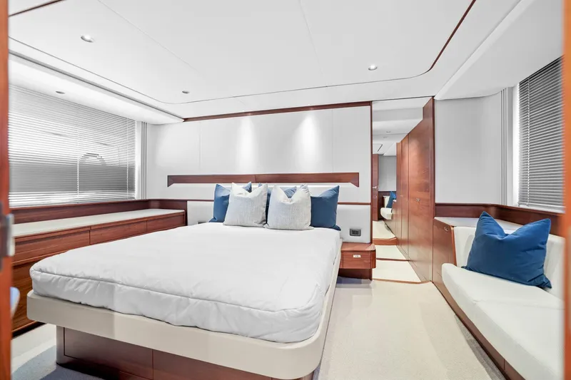 Slide: The Image of Luxurious cabin interior of 2026 Princess F65 yacht with modern design and plush bedding. - 53