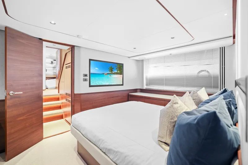 Slide: The Image of Luxurious bedroom interior of 2026 Princess F65 yacht with modern decor and ocean view. - 54