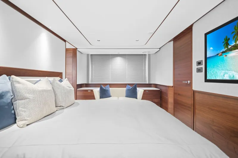 Slide: The Image of Luxurious bedroom interior of 2026 Princess F65 yacht with modern decor and ocean view. - 55
