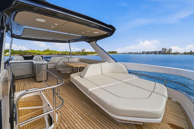 Slide: The Image of Luxurious 2026 Princess F65 yacht deck with elegant seating and scenic ocean view. - 64