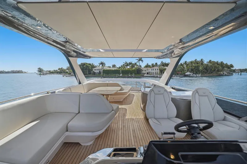 Slide: The Image of Luxurious 2026 Princess F65 yacht interior with elegant seating and scenic waterfront view. - 72