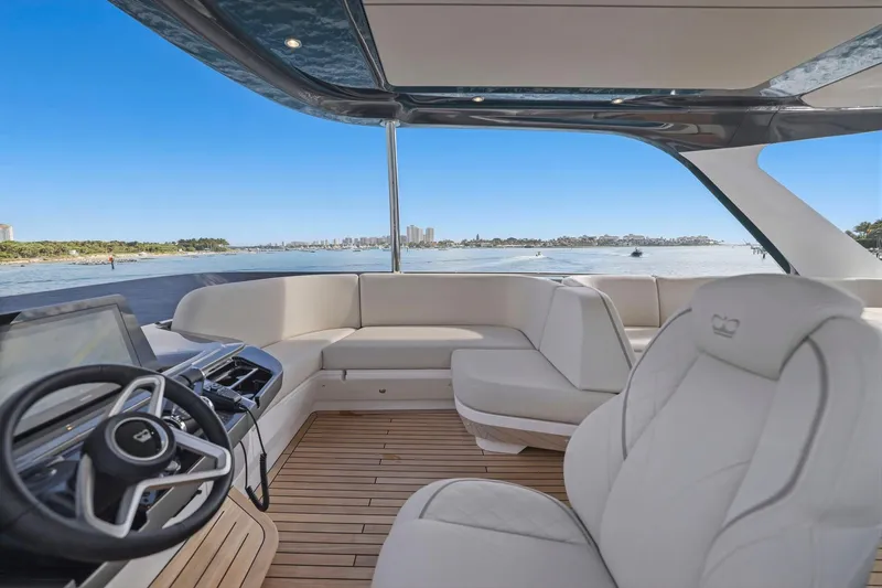 Slide: The Image of Luxurious 2026 Princess F65 yacht interior with sleek design and waterfront view. - 74