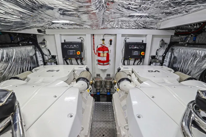 Slide: The Image of Engine room of 2026 Princess F65 yacht with dual MAN engines and fire suppression system. - 80