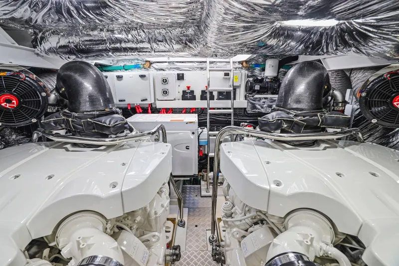 Slide: The Image of Engine room of a 2026 Princess F65 yacht, showcasing dual engines and advanced equipment. - 81